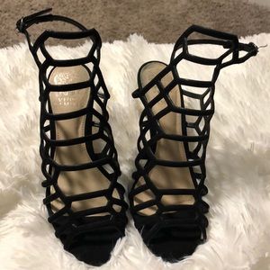 Black strappy suede heels.